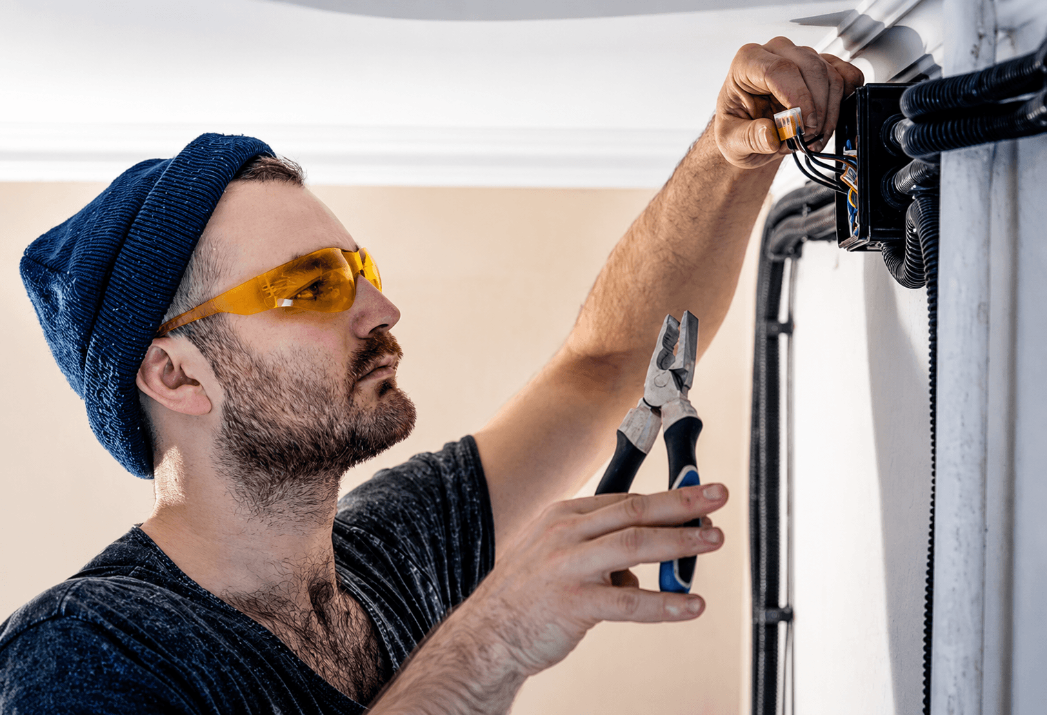 Technician repairing a residential air conditioning unit