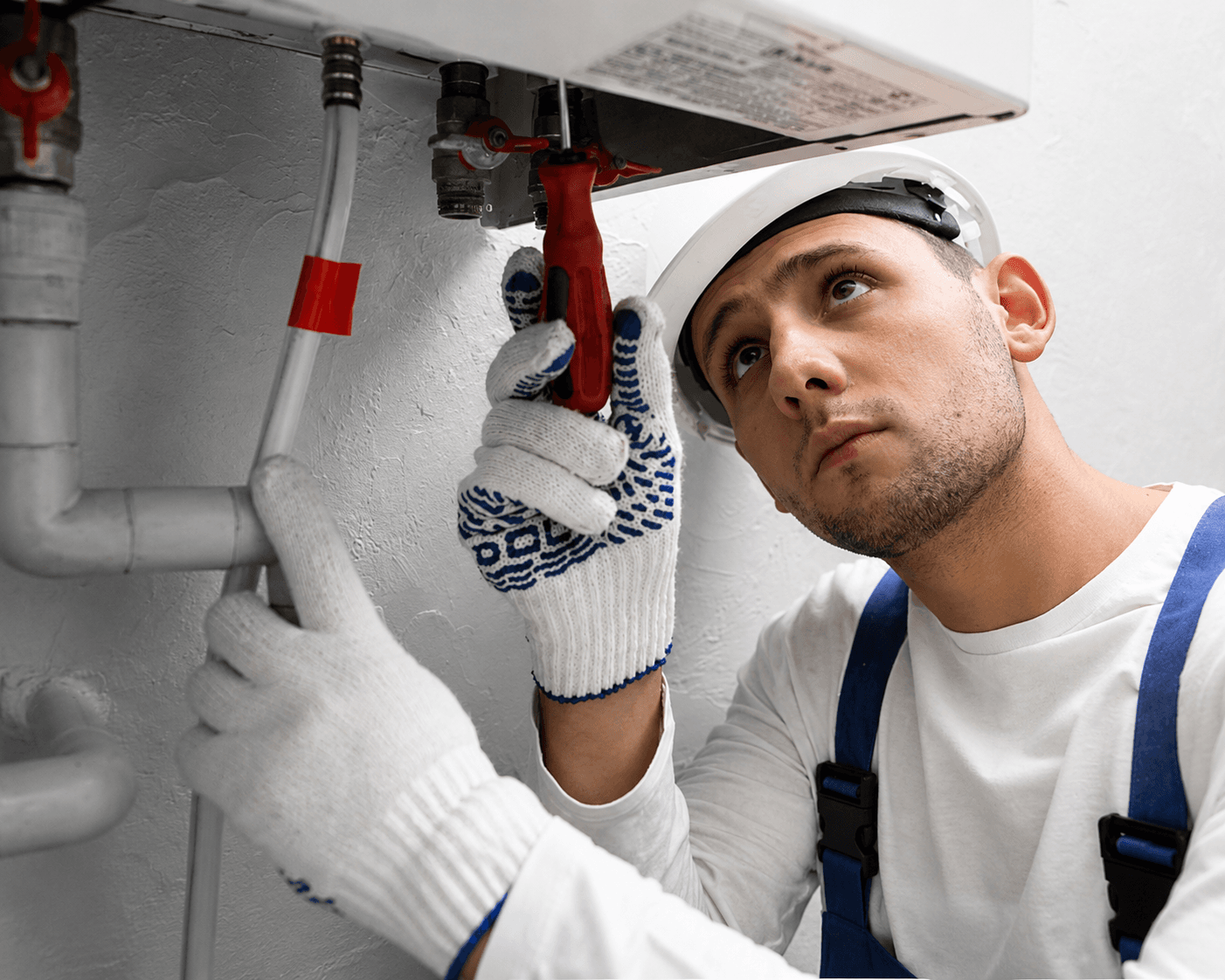 HVAC technician inspecting a home furnace